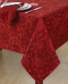 A festive complement to Dinner Party Noel table linens, this room-changing chair cover boasts a pretty red sheen and classic florals.