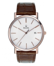 A clean, traditional timepiece from Bulova. Brown croc-embossed leather strap and rose-colored stainless steel case. Minimalist white dial with logo and thin rose-colored indexes and indicators. Three hands. Quartz movement. Water resistant to 30 meters. Three-year limited warranty.