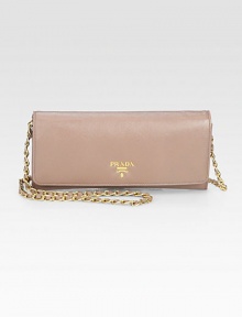 Saffiano leather in a foldover silhouette with goldtone hardware and chain strap.Detachable shoulder strap, 22¼ dropFlap snap closureMetal lettering logoGold-plated hardwareTwo outside open pockets under flapOne center zip compartmentOne inside open pocketSix credit card slotsFully lined8¼W X 4H X 1DMade in Italy Saffiano leather in a foldover silhouette with goldtone hardware and chain strap.Detachable shoulder strap, 22¼ dropFlap snap closureMetal lettering logoGold-plated hardwareTwo outside open pockets under flapOne center zip compartmentOne inside open pocketSix credit card slotsFully lined8¼W X 4H X 1DMade in Italy