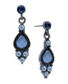 Wide, open spaces by 2028. The sky is the limit with these Montana-blue faceted crystal drop earrings accented by smaller round-cut blue crystals. Set in hematite-plated mixed metal. Approximate drop: 1-1/4 inches.