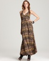 Boasting a painterly print, this Volcom maxi dress goes to great lengths to keep you in high style.