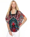 Bold, look-at-me color and a lush, exotic print give INC's sheer tunic a global-glam update!