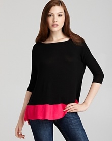 A flash of highlighter-bright color at the hem electrifies this Bailey 44 sweater for trend-perfect fall style. A flash of highlighter-bright color at the hem electrifies this Bailey 44 sweater for trend-perfect fall style.