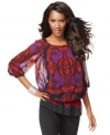 INC mixes rich colors and an intricate print for a peasant top that's touched with exotic charm!