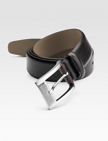 A smooth leather dress style finished with a polished brass buckle. About 1¼ wide Made in Italy A smooth leather dress style finished with a polished brass buckle. About 1¼ wide Made in Italy
