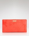 Compact enough to slip inside a purse, yet large enough for all the essentials. This floral-embossed leather wallet from kate spade new york is a pretty-practical pick.