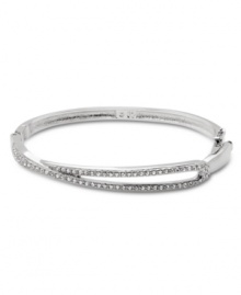 Demure enough for daytime yet equally elegant for evening, Swarovski's Hermine Bangle is a perfectly practical and versatile style. Crafted in silver tone mixed metal, it's adorned with glittering pavé crystals. Approximate length: 7-1/4 inches. Demure enough for daytime yet equally elegant for evening, Swarovski's Hermine Bangle is a perfectly practical and versatile style. Crafted in silver tone mixed metal, it's adorned with glittering pavé crystals. Approximate length: 7-1/4 inches.