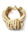 Don't settle for a single strand. ABS by Allen Schwartz's knotted bracelet ups the glamour factor with chains and pearls. Clasp on the substantial style and captivate at cocktail hour.