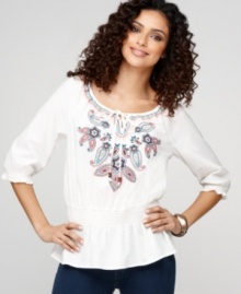 A peplum hem and charming embroidery elevate a classic peasant top from BandolinoBlu. Complete the boho-chic look with hoop earrings or an armful of bangles.