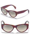 Retro-inspired cat eye sunglasses by Ray-Ban, one of the must-have accessories of the season.