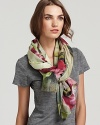 Bindya's luxurious cashmere and silk scarf features an elegant floral print in earthy tones.