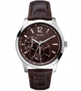 The perfect complement to casually cool style, this handsome GUESS watch outlasts trends.