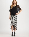Stretch jersey with a playfully ruffled hem and asymmetrical stripes that make you look slimmer. Elastic waistbandAsymmetrical ruffle hemAbout 39 long96% rayon/4% spandexHand washMade in USAModel shown is 5'10 (177cm) wearing US size 4.