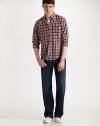 A dressed-down, utterly relaxed fit in superior Japanese denim, dark-washed and cleanly styled for a perfect finish. Five-pocket style Signature stitching on back pockets Inseam, about 34 Cotton/lycoell/polyurethane Machine wash Made in USA 
