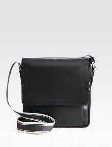 Remarkably crafted and shaped for the modern man of style, in lightly pebbled calfskin leather with logo strap detail.Magnetic flap closureAdjustable shoulder strapExterior, interior zip pocketsFully linedLeather26W x 28H x 2DMade in Italy Remarkably crafted and shaped for the modern man of style, in lightly pebbled calfskin leather with logo strap detail.Magnetic flap closureAdjustable shoulder strapExterior, interior zip pocketsFully linedLeather26W x 28H x 2DMade in Italy