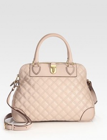 This elegantly quilted style is constructed with luxurious leather and features a decorative push-lock detail. Double top handles, 5 dropAdjustable shoulder strap, 17-22¾ dropTop zip closureProtective metal feetOne outside open pocketCotton lining14½W X 10H X 5½DMade in Italy This elegantly quilted style is constructed with luxurious leather and features a decorative push-lock detail. Double top handles, 5 dropAdjustable shoulder strap, 17-22¾ dropTop zip closureProtective metal feetOne outside open pocketCotton lining14½W X 10H X 5½DMade in Italy