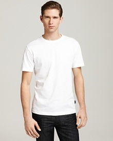 A classic tee in ultrasoft flame jersey. Short sleeves and straight hem. Tag detail on lower left. A classic tee in ultrasoft flame jersey. Short sleeves and straight hem. Tag detail on lower left.
