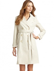 THE LOOKNotched lapelLong sleeves with fabric tab on cuffsButton closureTie waistDual flap pocketsCrisscross fabric detail in backTHE FITAbout 38 from shoulder to hemTHE MATERIAL81% cotton/19% nylonSilk liningCARE & ORIGINDry cleanMade in USAModel shown is 5'10 (177cm) wearing US size 4. THE LOOKNotched lapelLong sleeves with fabric tab on cuffsButton closureTie waistDual flap pocketsCrisscross fabric detail in backTHE FITAbout 38 from shoulder to hemTHE MATERIAL81% cotton/19% nylonSilk liningCARE & ORIGINDry cleanMade in USAModel shown is 5'10 (177cm) wearing US size 4.