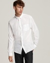 Cut slim in basic white, it's so easy to wear -- the essential John Varvatos shirt.