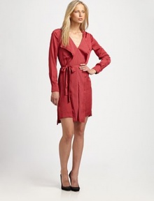 A modern take on a the button-front shirtdress, this airy sateen design boasts a draped front placket and waist-defining self-belt.Strappy necklineChest pocketFoldover button placketLong sleevesButton cuffsSelf-beltBack box pleatAbout 20 from natural waistPolyesterDry cleanImportedModel shown is 5'8½ (174cm) wearing US size Small.