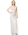 Exuding classic glamour in a floor-length column silhouette, this elegant sleeveless gown from Lauren by Ralph Lauren is designed in sleek metallic jersey for show-stopping appeal.