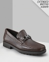 Rich leather with a practical rubber sole. Brushed silver buckle adds to its sophistication. Ferragamo is engraved in the middle of the buckle. Subtle top stitching on the front.