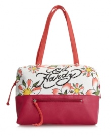 A fresh floral print with rocker-chic accents, this traffic-stopping tote by Ed Hardy is sure to turn heads. Sparkling rhinestones decorate signature front logo on floral detailed canvas. A fresh floral print with rocker-chic accents, this traffic-stopping tote by Ed Hardy is sure to turn heads. Sparkling rhinestones decorate signature front logo on floral detailed canvas.
