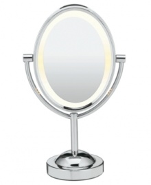 Shine some light on parts of your face that you usually miss with a double-sided mirror that provides high-voltage illumination on 1x and 7x magnifying sides, so no patch of skin is left behind. With a sharp chrome finish, this mirror fits right into your modern home. 1-year warranty. Model BE151T. Shine some light on parts of your face that you usually miss with a double-sided mirror that provides high-voltage illumination on 1x and 7x magnifying sides, so no patch of skin is left behind. With a sharp chrome finish, this mirror fits right into your modern home. 1-year warranty. Model BE151T.