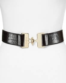 Cole Haan defines the waist with croc-embossed leather and a bold interlocking buckle. Cole Haan defines the waist with croc-embossed leather and a bold interlocking buckle.
