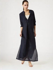 Long version of everyone's favorite dress in lightweight cotton with half button placket.Band collarHalf button placketPatch pocketLong sleeves with button cuffsInverted front pleatSide slitsBack yoke with shirringAbout 44 from natural waistCottonDry cleanImported Long version of everyone's favorite dress in lightweight cotton with half button placket.Band collarHalf button placketPatch pocketLong sleeves with button cuffsInverted front pleatSide slitsBack yoke with shirringAbout 44 from natural waistCottonDry cleanImported