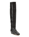 Luxurious and leg-lengthening, Loeffler Randall's over-the-knee boots shine with rich leather. Pair with this season's silken skirts for a study in decadent texture.