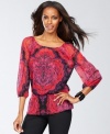 So pretty, with lots of rich color to boot -- INC's peplum peasant top finds the right balance between boho and refined style.