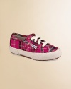 Colorful pattern adds punch to these Italian-designed classics on bouncy rubber soles for cushioned comfort. Four-eyelet lace-ups Logo tab on side Tweed upper Leather lining Vulcanized rubber sole Imported