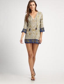 Chic crepe provides the luxe backdrop for this design featuring complementary paisley and floral prints.V-neckKeyhole necklineTassel tiesThree-quarter sleevesContrasting trimPull-on styleCottonMachine washImported Chic crepe provides the luxe backdrop for this design featuring complementary paisley and floral prints.V-neckKeyhole necklineTassel tiesThree-quarter sleevesContrasting trimPull-on styleCottonMachine washImported