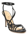 Make a glittering entrance in kate spade new york's Stephanie sandals, showcased in a jet black hue for evening allure.