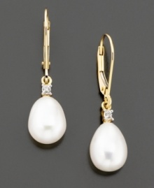 Cultured freshwater pearls (8x10 mm) and sparkling diamond accents combine for a truly elegant look. Set in 14k gold. Cultured freshwater pearls (8x10 mm) and sparkling diamond accents combine for a truly elegant look. Set in 14k gold.
