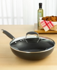 Truly the ultimate in every sense, this versatile pan is for cooks who appreciate sleek looks and great performance. Designed with sloped sides, the pan allows for easy ingredient handling, letting you rotate, stir and toss with ease. Dupont's Autograph® 2 coating, surpassing all other nonstick formulas for effectiveness and durability. Lifetime limited warranty. Truly the ultimate in every sense, this versatile pan is for cooks who appreciate sleek looks and great performance. Designed with sloped sides, the pan allows for easy ingredient handling, letting you rotate, stir and toss with ease. Dupont's Autograph® 2 coating, surpassing all other nonstick formulas for effectiveness and durability. Lifetime limited warranty.