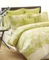 It's always greener. A modern print of botanical silhouettes transforms your room into a tropical oasis with Tommy Bahama's Paradise Isle comforter set. Featuring pure cotton. Includes white bedskirt finished with green trim.