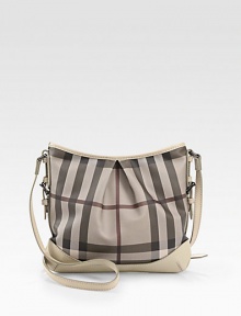 Chic Burberry check PVC, shaped by soft pleats in a slouchy carryall, finished with rich calfskin trim.Adjustable crossbody strap, 19-22½ dropTop zip closureOne inside zip pocketTwo inside open pocketsCotton lining12W X 10H X 1/2DImported