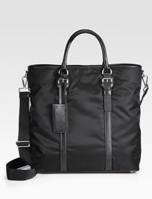 An everyday essential, handsomely crafted in tessuto nylon, trimmed with textured saffiano leather.Snap button closureDouble top handlesAdjustable shoulder strapInterior zip pocketNylon15W x 15H x 7DMade in Italy An everyday essential, handsomely crafted in tessuto nylon, trimmed with textured saffiano leather.Snap button closureDouble top handlesAdjustable shoulder strapInterior zip pocketNylon15W x 15H x 7DMade in Italy