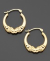 Classic, antiquated style makes these 14k gold hoop earrings one of a kind. Approximate diameter: 1/2 inch.