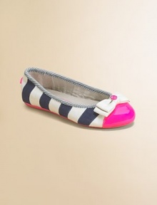 A vibrant cap toe and contrasting stripes add punches of color to this not-so-basic pair of canvas flats.Slip-on stylePolyurethane and cotton upper80% cotton/20% polyester liningRubber solePadded insoleImported A vibrant cap toe and contrasting stripes add punches of color to this not-so-basic pair of canvas flats.Slip-on stylePolyurethane and cotton upper80% cotton/20% polyester liningRubber solePadded insoleImported