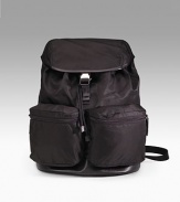 Nylon backpack with outside double pockets and clip closure. Leather trim Jacquard lining 13¾H X 11½L X 6½W Made in Italy 