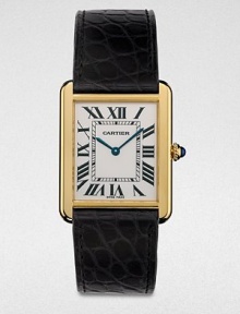 From the Tank Collection. A radiant 18k gold timepiece that combines the past with the present, making it quintessentially Cartier. Quartz movementWater resistant to 3 ATMRectangular 18k gold case, 34.8mm (1.4) X 27.4mm (1)Smooth bezelPale silver opaline dialRoman numeral hour markersAlligator strap with 18k gold buckleMade in Switzerland 