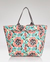 Forgo the garden variety in favor of LeSportsac's printed floral tote. Perfect for spontaneous trips or weekend errands, this roomy bag proves practical can be pretty.
