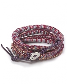 Add a touch of boho to your look with this colorful, gold-embellished leather and cotton wrap bracelet from Chan Luu.