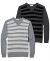 DKNY Jeans updates a V-neck sweater silhouette by printing stripes across the torso.