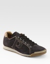 Bi-color piping sharpens the profile of an enduring suede silhouette. Leather liningPadded insoleRubber soleImported