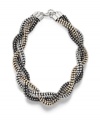 Triple threat. Bar III's chic braided necklace creates a statement all its own with sparkling clear and hematite crystals and a clever tri-tone design. Crafted in burnished silver, gold, and hematite tone mixed metal. Approximate length: 18 inches + 1-inch extender.