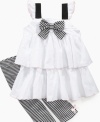 Getting her ready is as simple as black and white with this bold ruffle dress and legging set from Kids Headquarters.